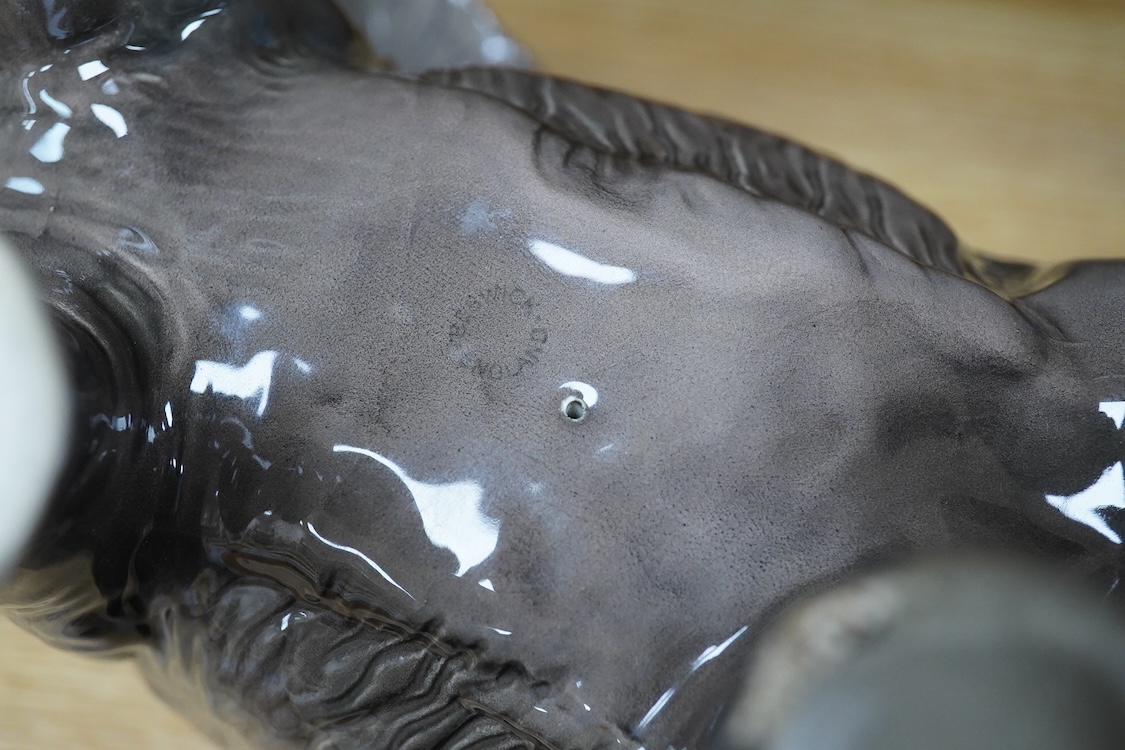 A Beswick model of an elephant and a Staffordshire jug, c.1840, largest 34cm wide